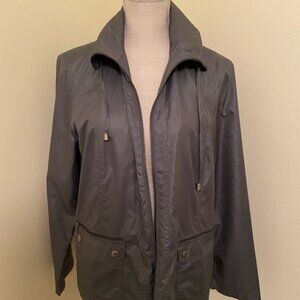 Brand new Chico’s Zenergy gray nylon jacket with hide-away hood